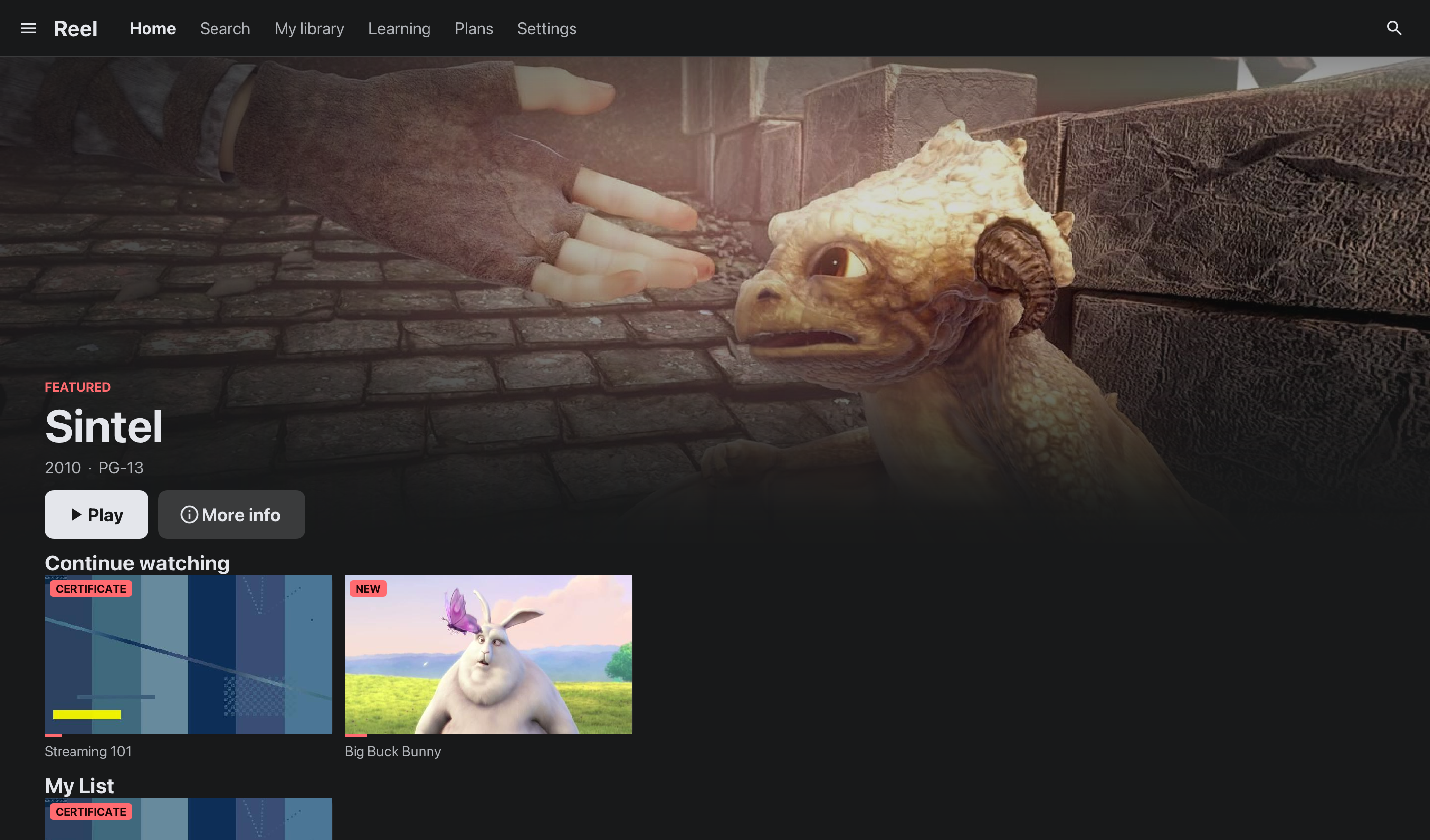 The home screen in a desktop window: the featured title’s artwork across the whole width, the sections of the app along the top bar, and rows of titles under the artwork